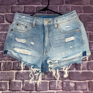 Divided brand distressed denim shorts in a light wash size 6.